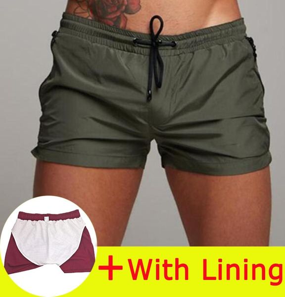 summer beach shorts men swimming trunks men swim bathing male briefs shorts for swimming man swimsuits surf board swimwear1379481, White;black
summer beach shorts men swimming trunks men swim bathing male briefs shorts for swimming man swimsuits surf board swimwear1379481, White;black