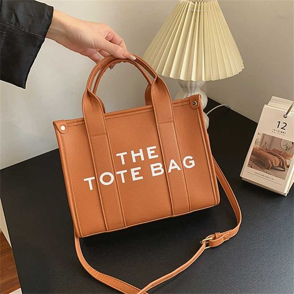 2023 new women's fashion letter handbag large capacity one shoulder oblique straddle tote bag off wholesale
2023 new women's fashion letter handbag large capacity one shoulder oblique straddle tote bag off wholesale