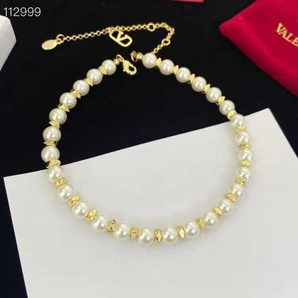 fashion designer valentino pearl v-letter brass necklace versatile and high end sense small design collar chain with logo and box, Silver
fashion designer valentino pearl v-letter brass necklace versatile and high end sense small design collar chain with logo and box, Silver