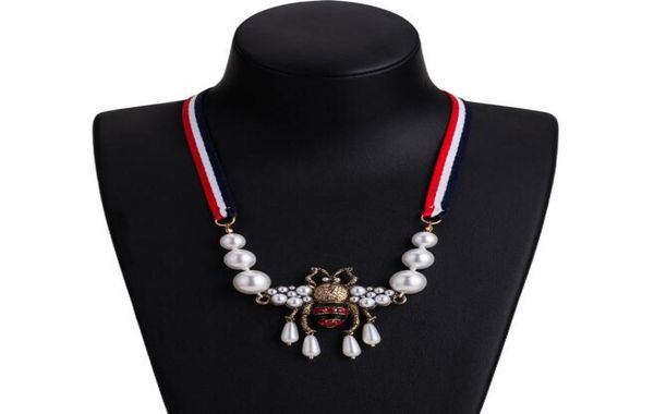 whole bohemian fashion crystal pearl bee pendant necklace striped ribbon sweater chain women charm jewelry accessories9001023, Silver
whole bohemian fashion crystal pearl bee pendant necklace striped ribbon sweater chain women charm jewelry accessories9001023, Silver