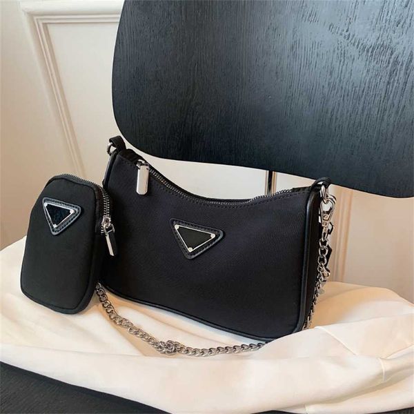 three in one underarm crescent nylon canvas versatile chain bag single shoulder diagonal cross handbag off wholesale
three in one underarm crescent nylon canvas versatile chain bag single shoulder diagonal cross handbag off wholesale