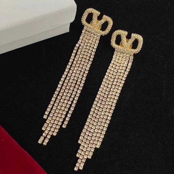 fashion designer valentino warren's v-letter rhinestone long tassel earrings feminine and versatile brass material female with logo and, Golden;silver
fashion designer valentino warren's v-letter rhinestone long tassel earrings feminine and versatile brass material female with logo and, Golden;silver