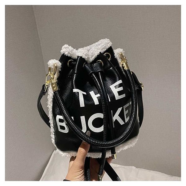 women 2023 new fashion selling lamb hair water bucket with printing for women's shoulder bag clearance 85% off
women 2023 new fashion selling lamb hair water bucket with printing for women's shoulder bag clearance 85% off