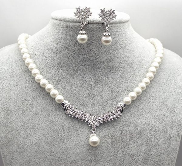 white gold plated cream faux glass pearl and rhinestone crystal wedding necklace and earrings jewelry sets3932162, Silver
white gold plated cream faux glass pearl and rhinestone crystal wedding necklace and earrings jewelry sets3932162, Silver