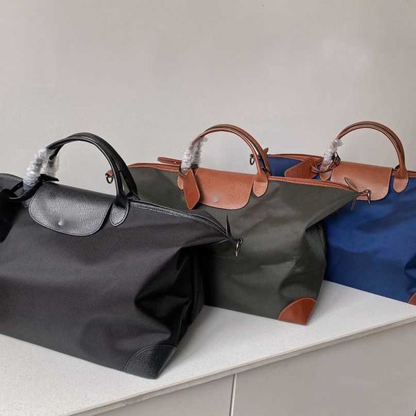 luxury designer travel bag duffle bag handbag fashion longchammp bags large capacity portable oblique cross men's and women's bags
luxury designer travel bag duffle bag handbag fashion longchammp bags large capacity portable oblique cross men's and women's bags