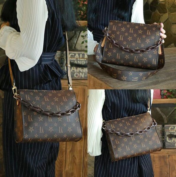 2023 fervent designer bag wash bag large capacity old flower chain bag clutch handbag cowhide pochette voyage shoulder bag cross body packag
2023 fervent designer bag wash bag large capacity old flower chain bag clutch handbag cowhide pochette voyage shoulder bag cross body packag