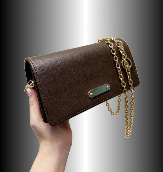 new designer chain bag wallet onchainlily gold hardware flip closure detachable chain m82509 fashion vintage one shoulder messenger handbag
new designer chain bag wallet onchainlily gold hardware flip closure detachable chain m82509 fashion vintage one shoulder messenger handbag