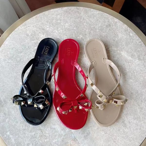 luxury woman slipper designer v bow nude red black studded flat slide jelly rubber rivet thong sandals summer beach outdoor shoe with box
luxury woman slipper designer v bow nude red black studded flat slide jelly rubber rivet thong sandals summer beach outdoor shoe with box
