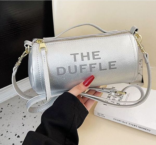 the duffle bag personalized cylinder handbag popular letter crossbody bags lady designer marc shoulder bag m0409
the duffle bag personalized cylinder handbag popular letter crossbody bags lady designer marc shoulder bag m0409