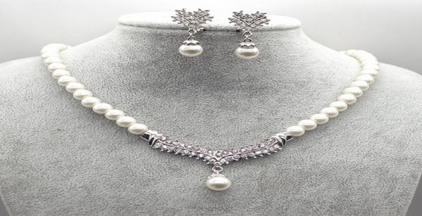 white gold plated cream faux glass pearl and rhinestone crystal wedding necklace and earrings jewelry sets5124093, Silver
white gold plated cream faux glass pearl and rhinestone crystal wedding necklace and earrings jewelry sets5124093, Silver