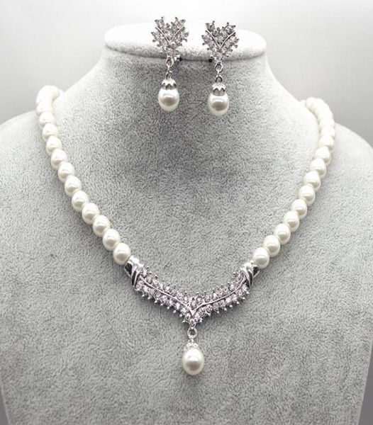 white gold plated cream faux glass pearl and rhinestone crystal wedding necklace and earrings jewelry sets1569215, Silver
white gold plated cream faux glass pearl and rhinestone crystal wedding necklace and earrings jewelry sets1569215, Silver