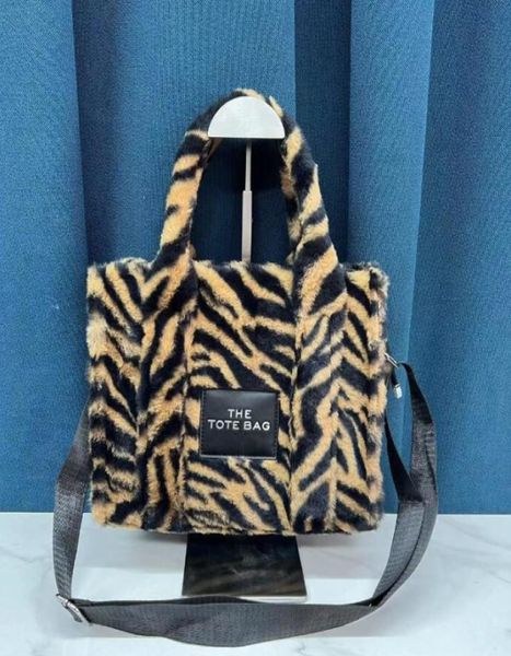 striped plush women039s tote bag popular letter crossbody shoulder bags handbag european and american style3672384
striped plush women039s tote bag popular letter crossbody shoulder bags handbag european and american style3672384