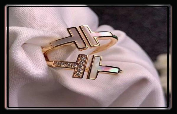 women ring 925 silver luxury designer rings men brand zirconia fashion rings t style classic jewelry 14k gold plated rose wed whol6507975
women ring 925 silver luxury designer rings men brand zirconia fashion rings t style classic jewelry 14k gold plated rose wed whol6507975
