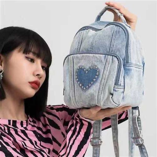 love diamond mini wash denim backpack vertical casual fashion outgoing backpack 230904
love diamond mini wash denim backpack vertical casual fashion outgoing backpack 230904