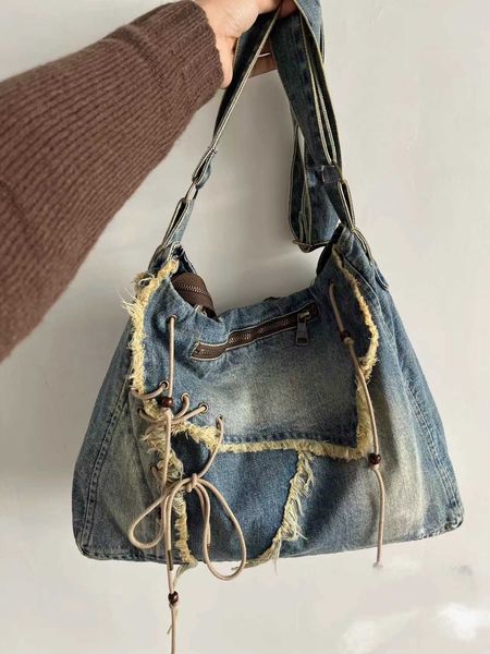 denim water washed brushed tassel messenger bag large capacity flip zipper messenger bag 230904
denim water washed brushed tassel messenger bag large capacity flip zipper messenger bag 230904