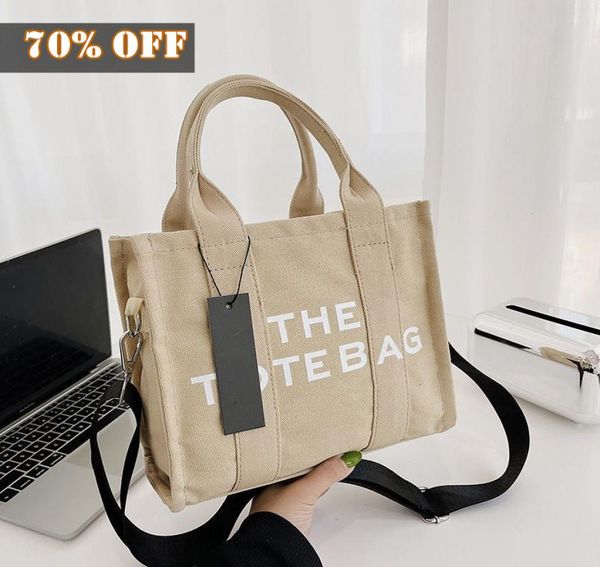 the tote bags large capacity practical women cosmetic bag canvas square handbag famous design bag casual shopping shoulder bag sol8675648
the tote bags large capacity practical women cosmetic bag canvas square handbag famous design bag casual shopping shoulder bag sol8675648
