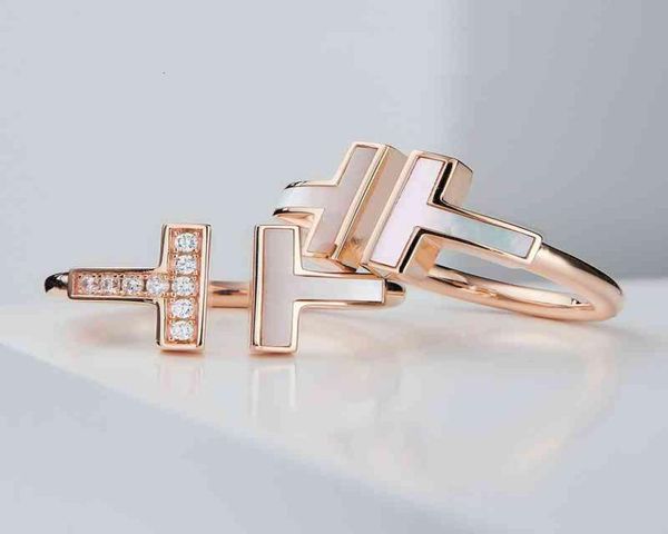 t family double white shell ring 925 sterling silver plated 18k gold open mother inlaid with diamond shaped9800031
t family double white shell ring 925 sterling silver plated 18k gold open mother inlaid with diamond shaped9800031
