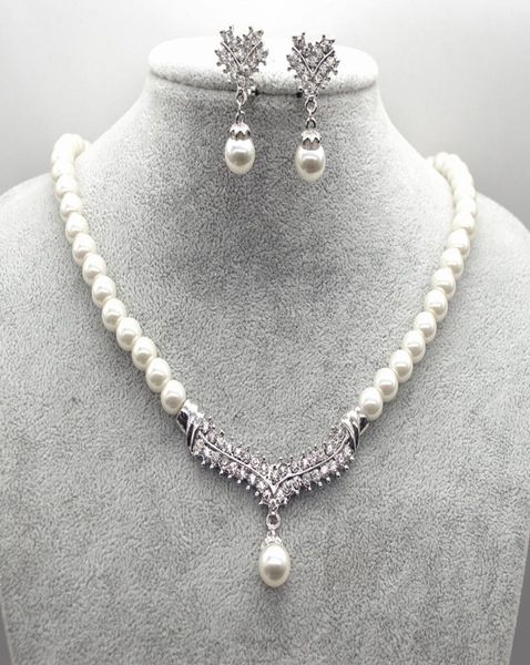 white gold plated cream faux glass pearl and rhinestone crystal wedding necklace and earrings jewelry sets1020138, Silver
white gold plated cream faux glass pearl and rhinestone crystal wedding necklace and earrings jewelry sets1020138, Silver