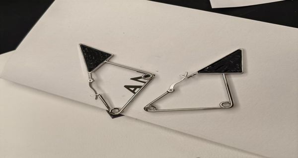 european and american triangle letters dangle chandelier punk couple earrings and fast delivery2488429, Silver
european and american triangle letters dangle chandelier punk couple earrings and fast delivery2488429, Silver
