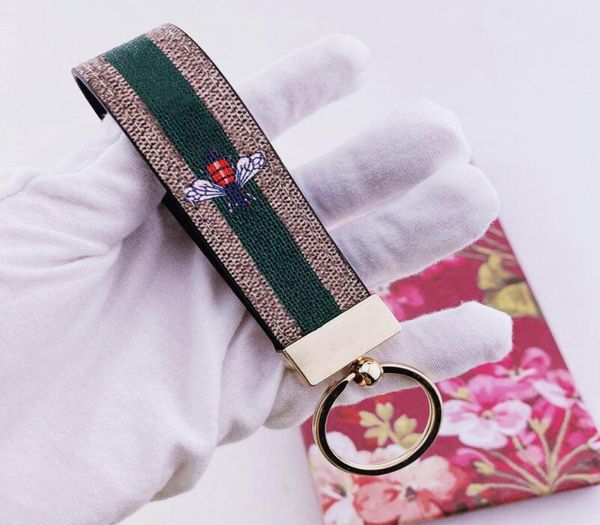 2022 designer keychain key chain buckle keychains lovers handmade leather brand colorful flowers bee snake bag pendant fashion acc8475992, Silver
2022 designer keychain key chain buckle keychains lovers handmade leather brand colorful flowers bee snake bag pendant fashion acc8475992, Silver