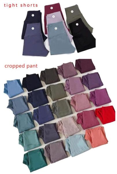 2027 designer solid color women yoga legging pants high waist tight shorts sports gym wear leggings elastic fitness lady ove1265250
2027 designer solid color women yoga legging pants high waist tight shorts sports gym wear leggings elastic fitness lady ove1265250