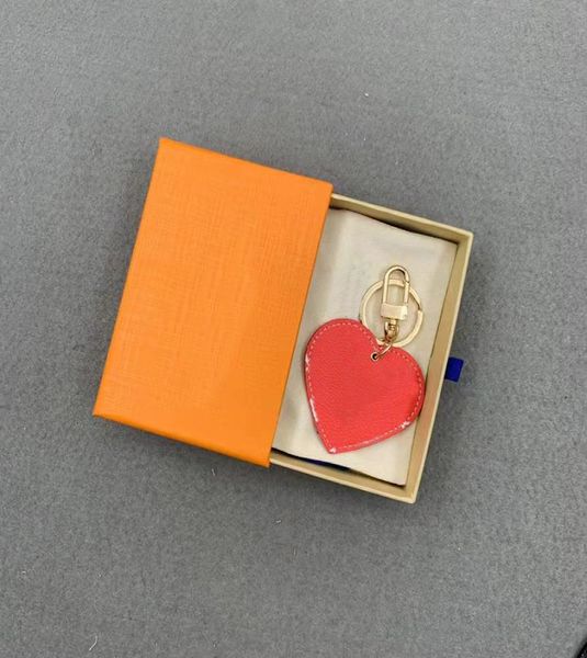 heart key chain buckle lovers bag charms handmade leather designers keychains men women bag pendant accessories with box2748130, Red;blue
heart key chain buckle lovers bag charms handmade leather designers keychains men women bag pendant accessories with box2748130, Red;blue
