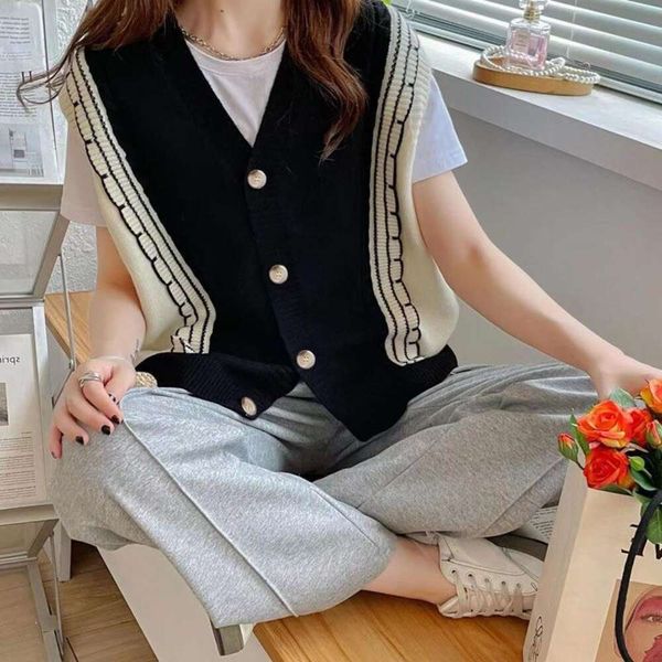 knitted cardigan vest womens autumn and winter casual color contrast wood ear edge loose coat sleeveless, Black;white
knitted cardigan vest womens autumn and winter casual color contrast wood ear edge loose coat sleeveless, Black;white