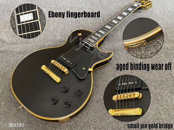 electric guitar solid black finished ebony fingerboard gold parts p90 black pickups aged parts and panit work
electric guitar solid black finished ebony fingerboard gold parts p90 black pickups aged parts and panit work