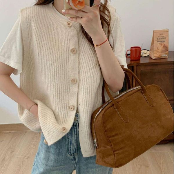 french retro pure colored vest knitted small cardigan folded jacket sweater womens spring and autumn, Black;white
french retro pure colored vest knitted small cardigan folded jacket sweater womens spring and autumn, Black;white
