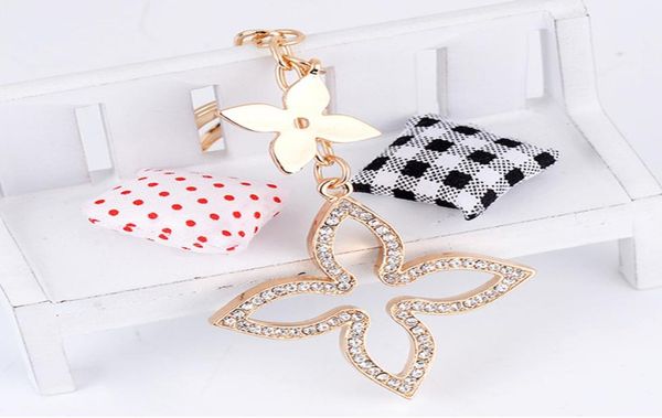 clover creative designer keychain gold gift fashion holder key auto metal keyring charm bag chain pendant whole vaqkk6123555, Silver
clover creative designer keychain gold gift fashion holder key auto metal keyring charm bag chain pendant whole vaqkk6123555, Silver