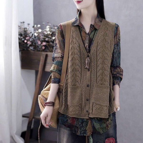 autumn vintage art v neck knitted sweater vest female coat hollowed out slim looking cardigan, Black;white
autumn vintage art v neck knitted sweater vest female coat hollowed out slim looking cardigan, Black;white