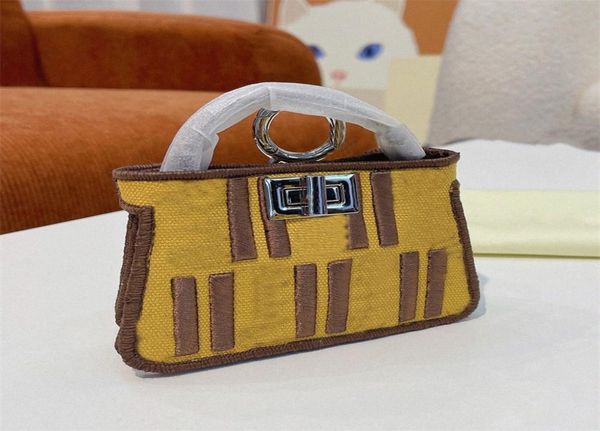 nano peekaboo mini baguette charm bags chain flap cross body shoulder coin purse luxury women lady waist bag embroidery canvas han8649907, Red;black
nano peekaboo mini baguette charm bags chain flap cross body shoulder coin purse luxury women lady waist bag embroidery canvas han8649907, Red;black