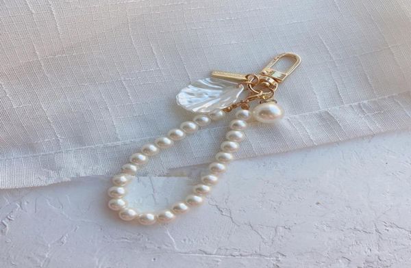 fashion designer keychain pearl car key chain alloy shell pendant buckle personalized keychain fashion bags pendant k9357426, Silver
fashion designer keychain pearl car key chain alloy shell pendant buckle personalized keychain fashion bags pendant k9357426, Silver
