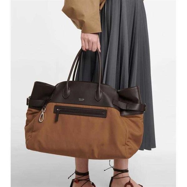 the row bag designer margaux 17 nylon collar large capacity travel handbag tote color collar leather bag for men and women251e
the row bag designer margaux 17 nylon collar large capacity travel handbag tote color collar leather bag for men and women251e