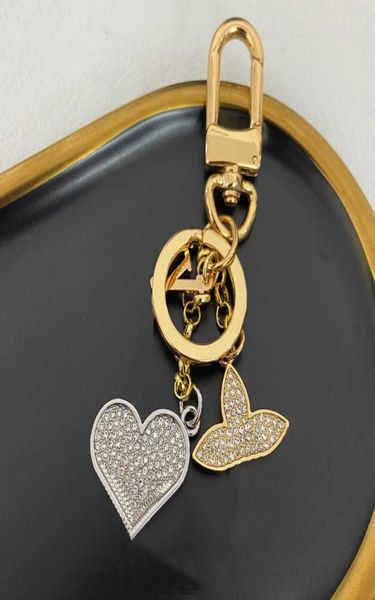 diamond fashion luxury designer keychain full diamonds key buckle flower letter silver detachable keychains for mens womens bag pe5344113
diamond fashion luxury designer keychain full diamonds key buckle flower letter silver detachable keychains for mens womens bag pe5344113