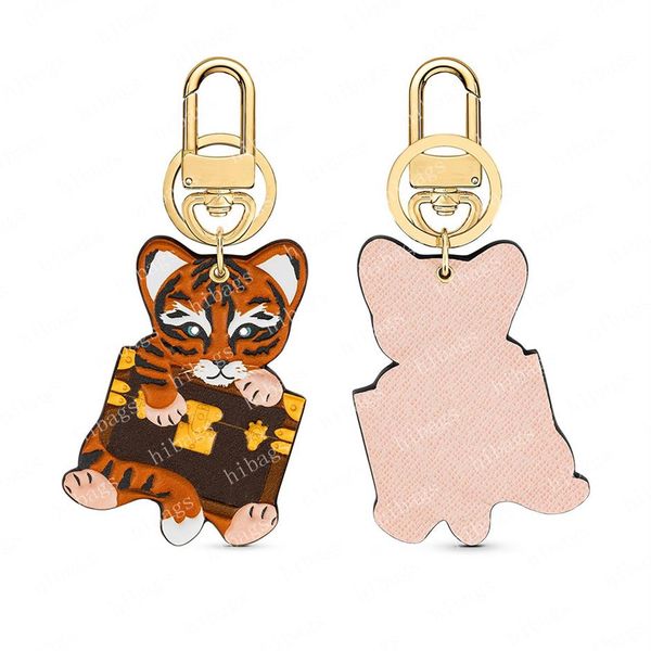 2022 facettes bag charm buckle key holder keychain lovers car letter leather keychains women bags pendant accessories 00557 69317 285i, Black
2022 facettes bag charm buckle key holder keychain lovers car letter leather keychains women bags pendant accessories 00557 69317 285i, Black