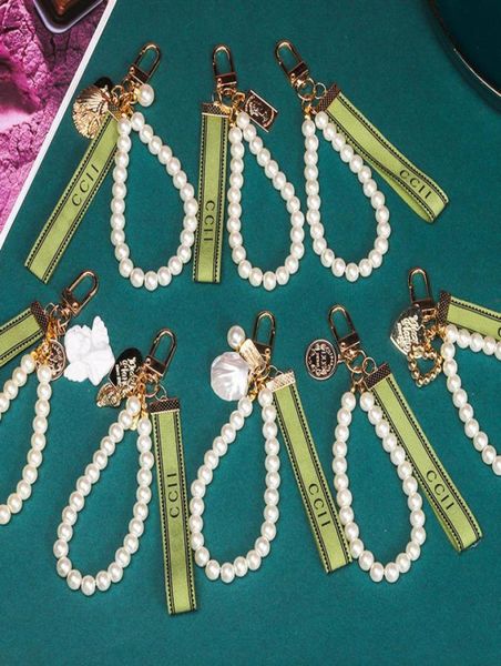 trendy keychain luxury designer keys pendant key buckle classic letter fabric pearls chain 4 styles keychains bag orn6777977, Silver
trendy keychain luxury designer keys pendant key buckle classic letter fabric pearls chain 4 styles keychains bag orn6777977, Silver
