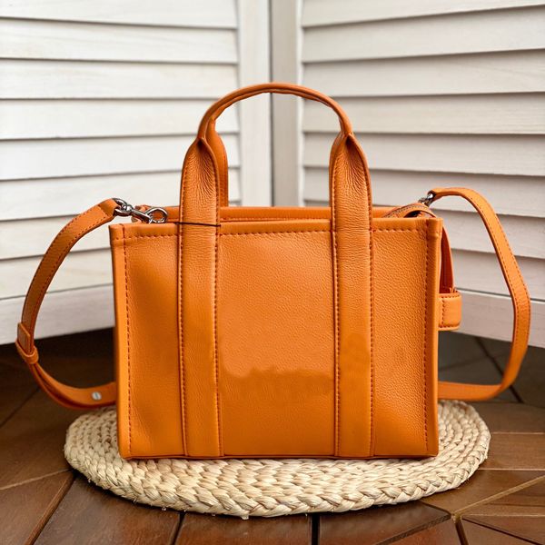 the tote bag leather embossing letter handbag capacity shopping bag women designer shoulder bag lady luxury famous brands pu shoulder bag
the tote bag leather embossing letter handbag capacity shopping bag women designer shoulder bag lady luxury famous brands pu shoulder bag