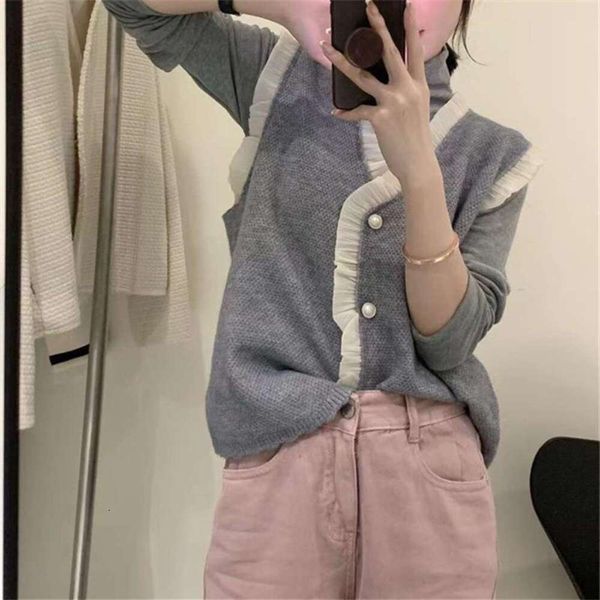 sweet and gentle knitted sweater vest for women autumn winter fashion temperament wooden ear edge stitching, Black;white
sweet and gentle knitted sweater vest for women autumn winter fashion temperament wooden ear edge stitching, Black;white