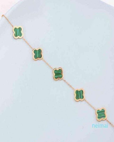 luxurious quality brand name flower with five flower nature stone pendant bracelet with rhombus clasp for women wedding gift2153634, Golden;silver
luxurious quality brand name flower with five flower nature stone pendant bracelet with rhombus clasp for women wedding gift2153634, Golden;silver