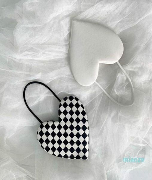 evening bags women love heartshaped simple black and white plaid handbag pu leather crossbody shoulder bag fashion 202177070104089642
evening bags women love heartshaped simple black and white plaid handbag pu leather crossbody shoulder bag fashion 202177070104089642