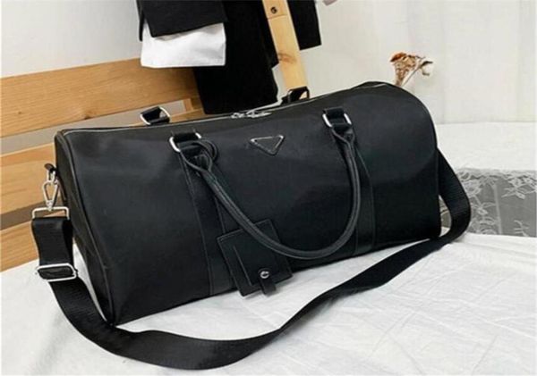 hight quality men fashion duffle bag triple black nylon travel bags mens handle luggage gentleman business tote with shoulder stra2100237
hight quality men fashion duffle bag triple black nylon travel bags mens handle luggage gentleman business tote with shoulder stra2100237