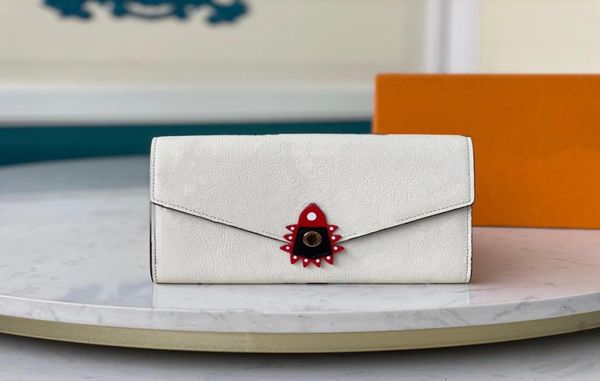 crafty sarah wallet empreinte leather cowhideleather lining in beige small goods printed black with the giant 695142169477, Red;black
crafty sarah wallet empreinte leather cowhideleather lining in beige small goods printed black with the giant 695142169477, Red;black