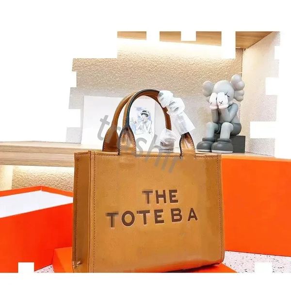 designer 5a the tote bag for woman embossing letter handbag luxury shoulder bags large capacity 34cm brown leather handbags women canvas ags
designer 5a the tote bag for woman embossing letter handbag luxury shoulder bags large capacity 34cm brown leather handbags women canvas ags