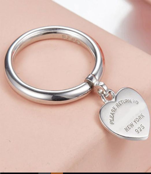 new logo stamp real 925sterling silver love heart pendant rings for women wedding jewelry anillos female round band t design rings gift83441
new logo stamp real 925sterling silver love heart pendant rings for women wedding jewelry anillos female round band t design rings gift83441