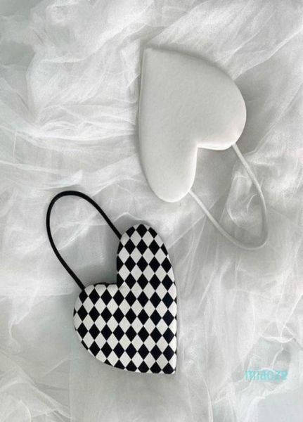 evening bags women love heartshaped simple black and white plaid handbag pu leather crossbody shoulder bag fashion 202177070106628648
evening bags women love heartshaped simple black and white plaid handbag pu leather crossbody shoulder bag fashion 202177070106628648