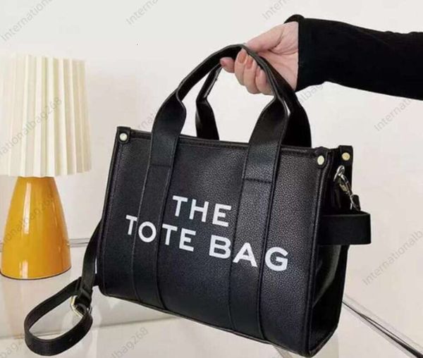 the tote bag ladies designer practical large capacity solid color letters crossbody one shoulder simple versatile leather bags luxury coin55
the tote bag ladies designer practical large capacity solid color letters crossbody one shoulder simple versatile leather bags luxury coin55