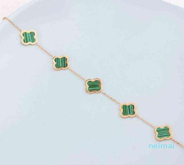 luxurious quality brand name flower with five flower nature stone pendant bracelet with rhombus clasp for women wedding gift8151390, Golden;silver
luxurious quality brand name flower with five flower nature stone pendant bracelet with rhombus clasp for women wedding gift8151390, Golden;silver
