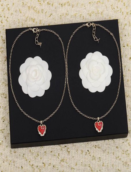 heart shpe drop earring with sparkly diamond and red color acrylic material pendant necklace for women wedding jewelry3885565, Silver
heart shpe drop earring with sparkly diamond and red color acrylic material pendant necklace for women wedding jewelry3885565, Silver