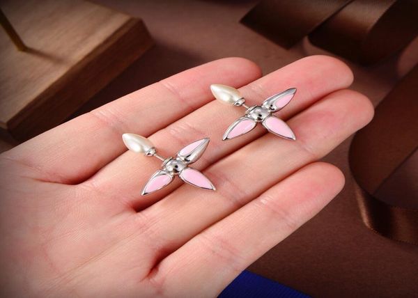 new arrival extravagant jewelry lady louisette studs charm classic monogram cross design earrings stainless steel silver flower el6879569, Golden;silver
new arrival extravagant jewelry lady louisette studs charm classic monogram cross design earrings stainless steel silver flower el6879569, Golden;silver